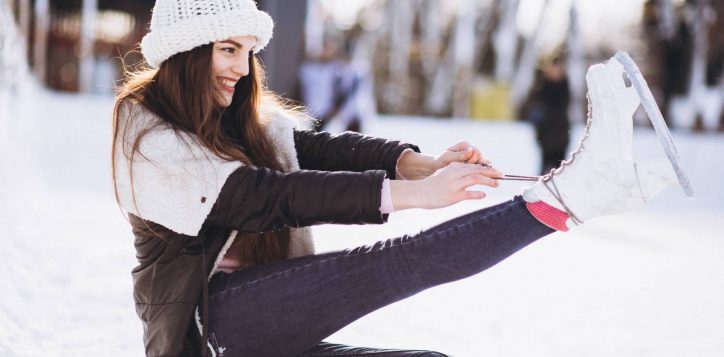 young-woman-ice-skating-rink-city-center-1-2